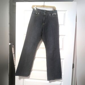 Dark blue jeans with detailed stitching